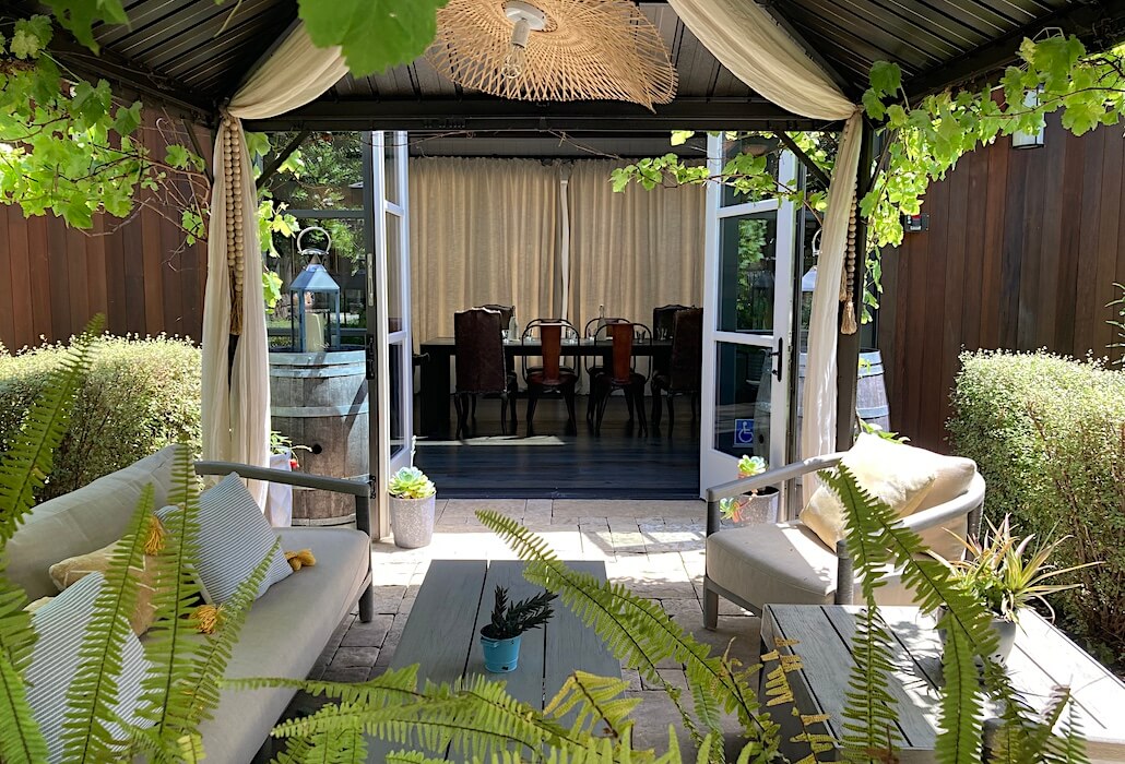 Outdoor cabana and indoor boardroom access at a top Napa Valley corporate meeting venue in the heart of Yountville.